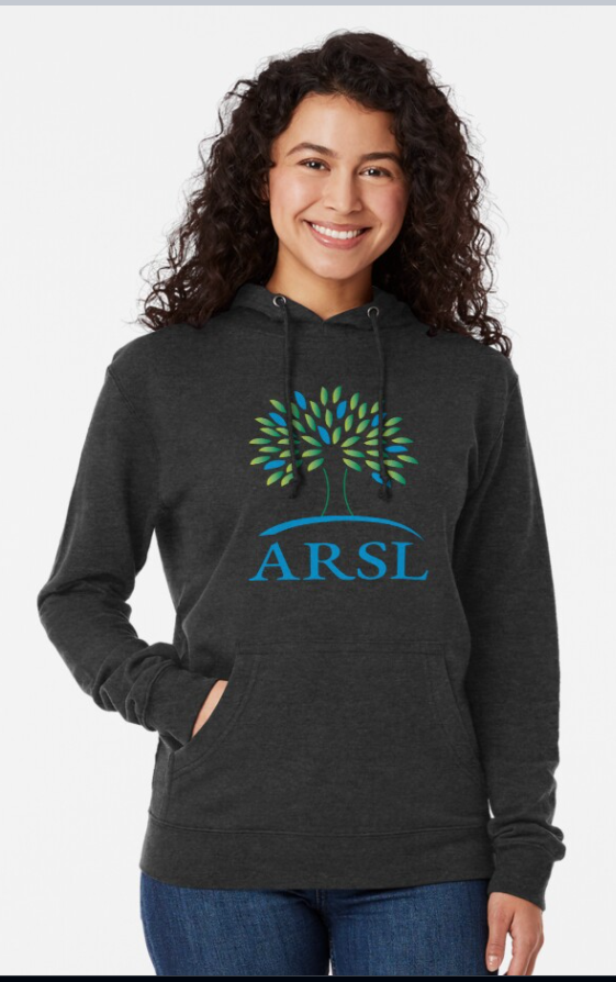 Person wearing a dark grey ARSL logo hoodie.