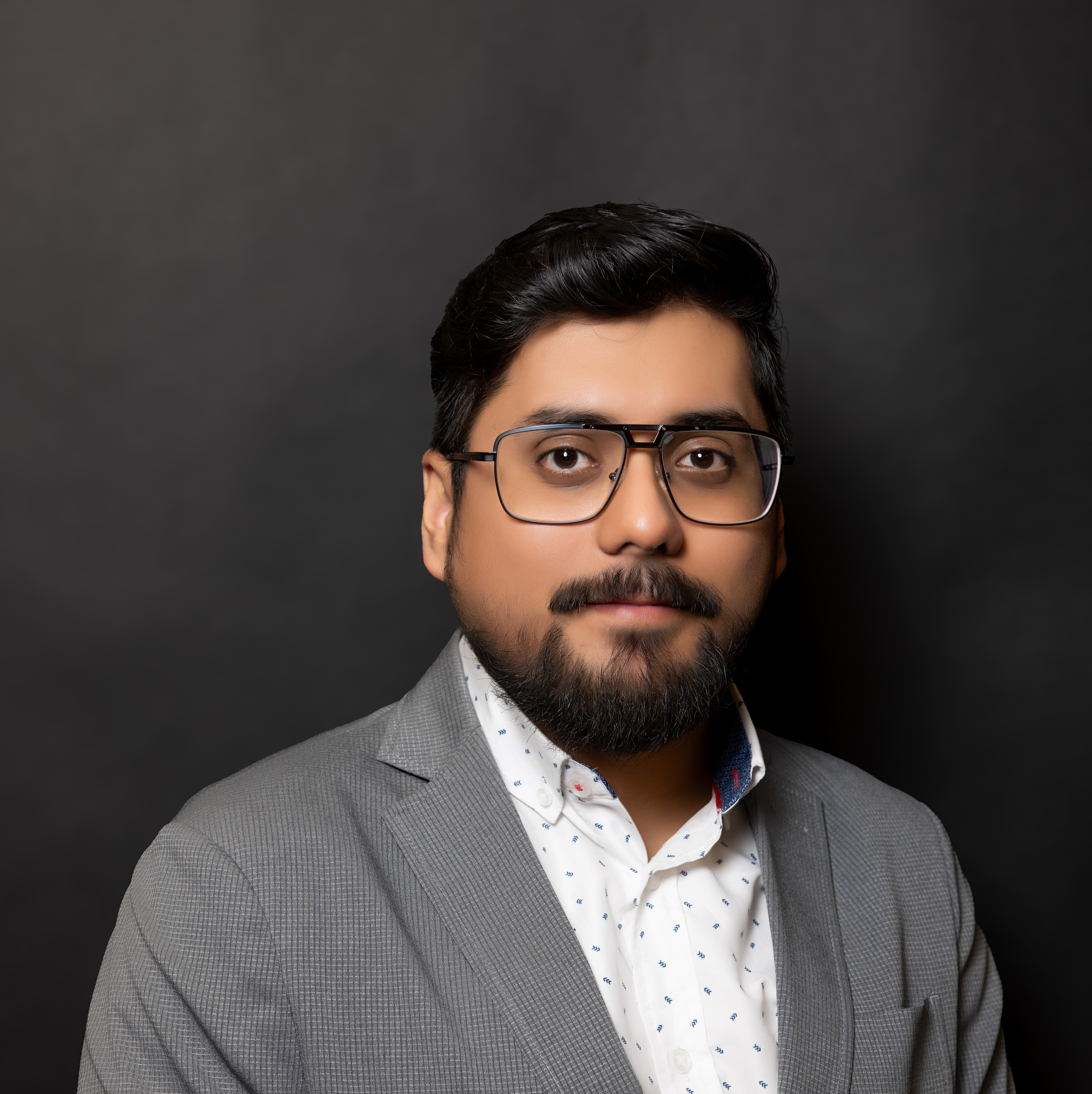 Headshot of Manuel Pasillas.