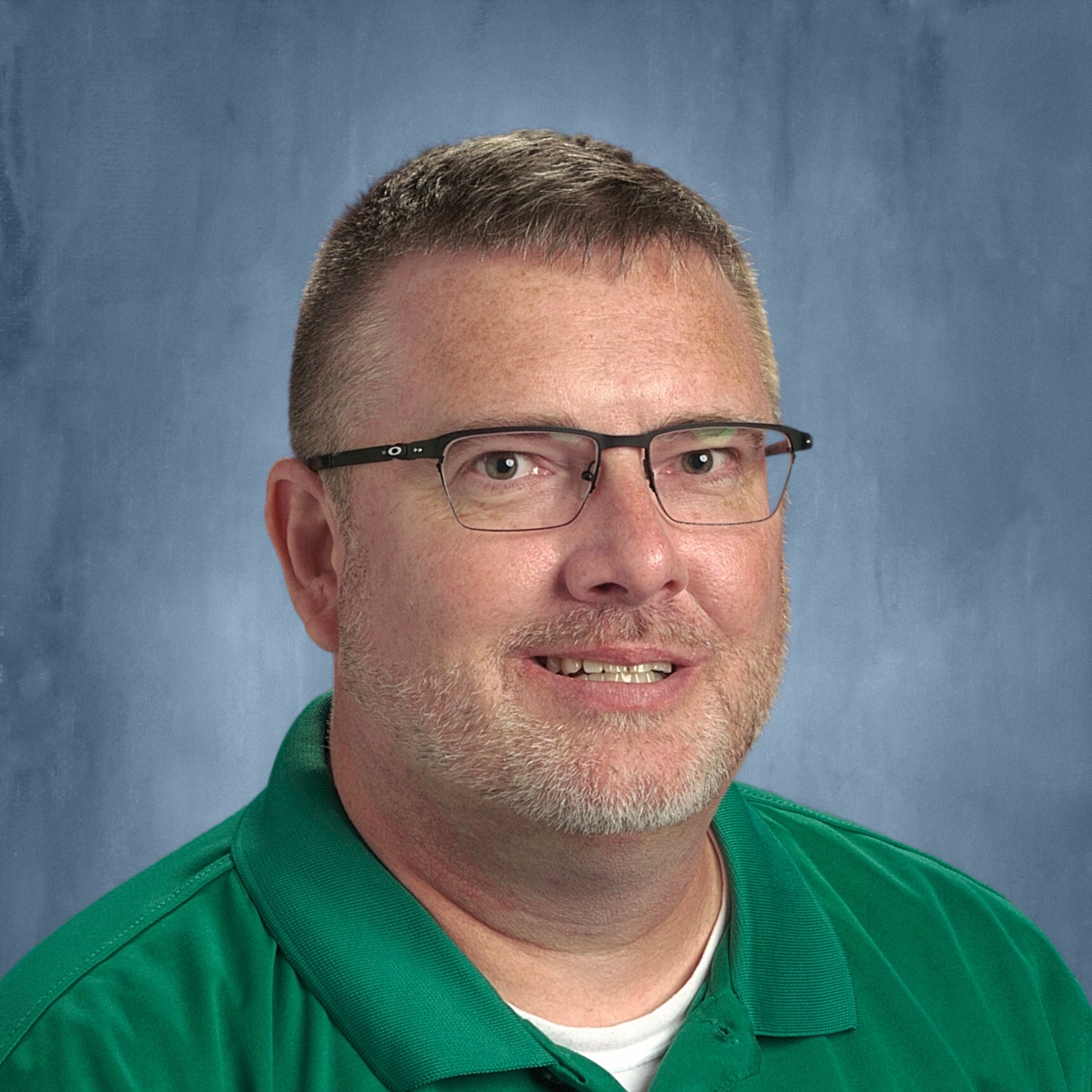 Headshot of Travis Manley.