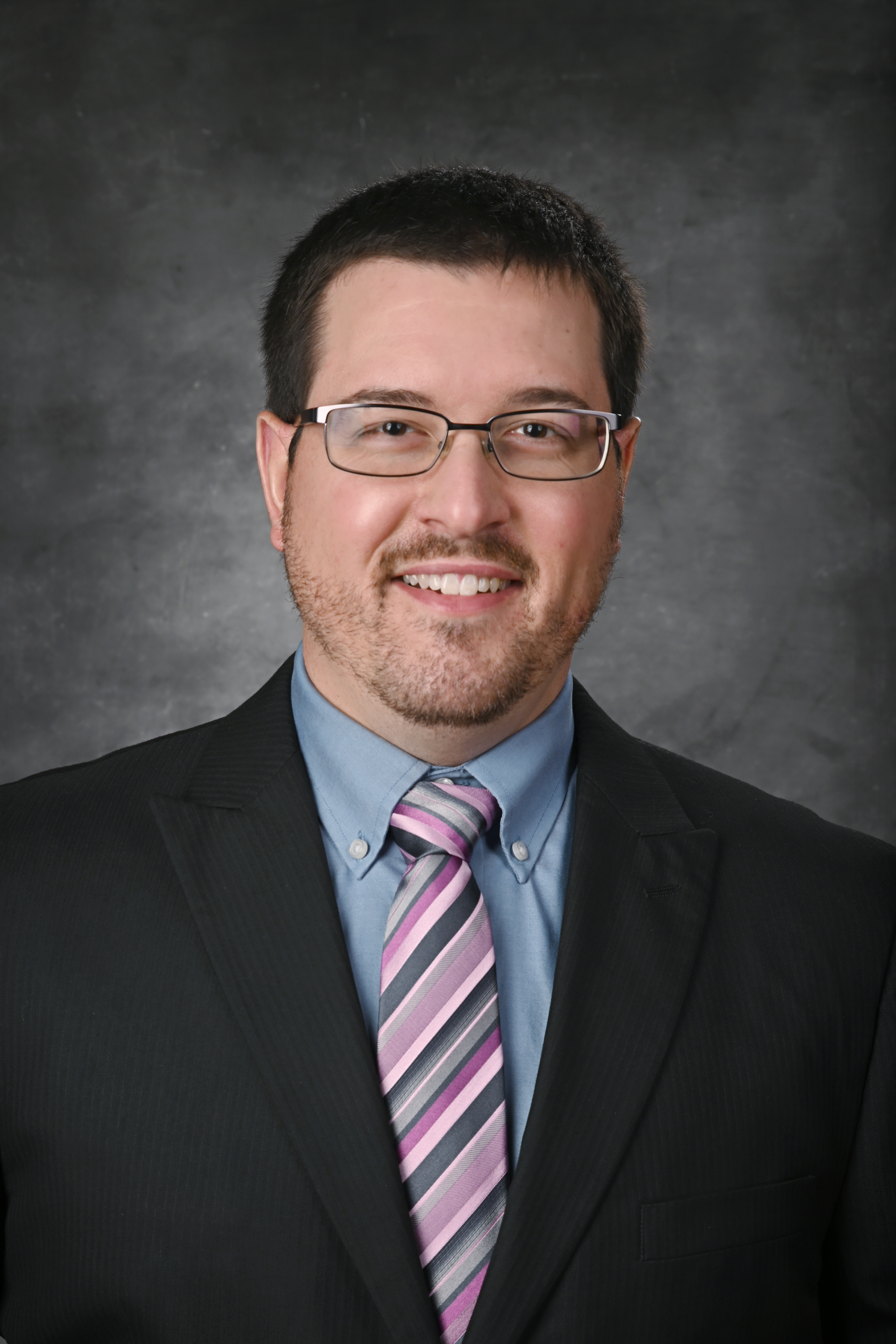 Headshot of Drew Wichterman.